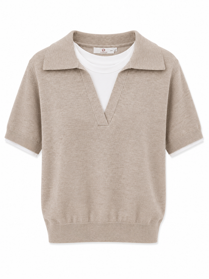 Kortærmet strikbluse med lag-på-lag look