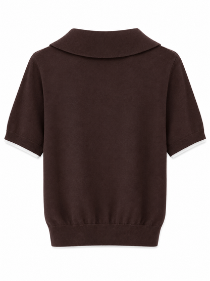 Kortærmet strikbluse med lag-på-lag look