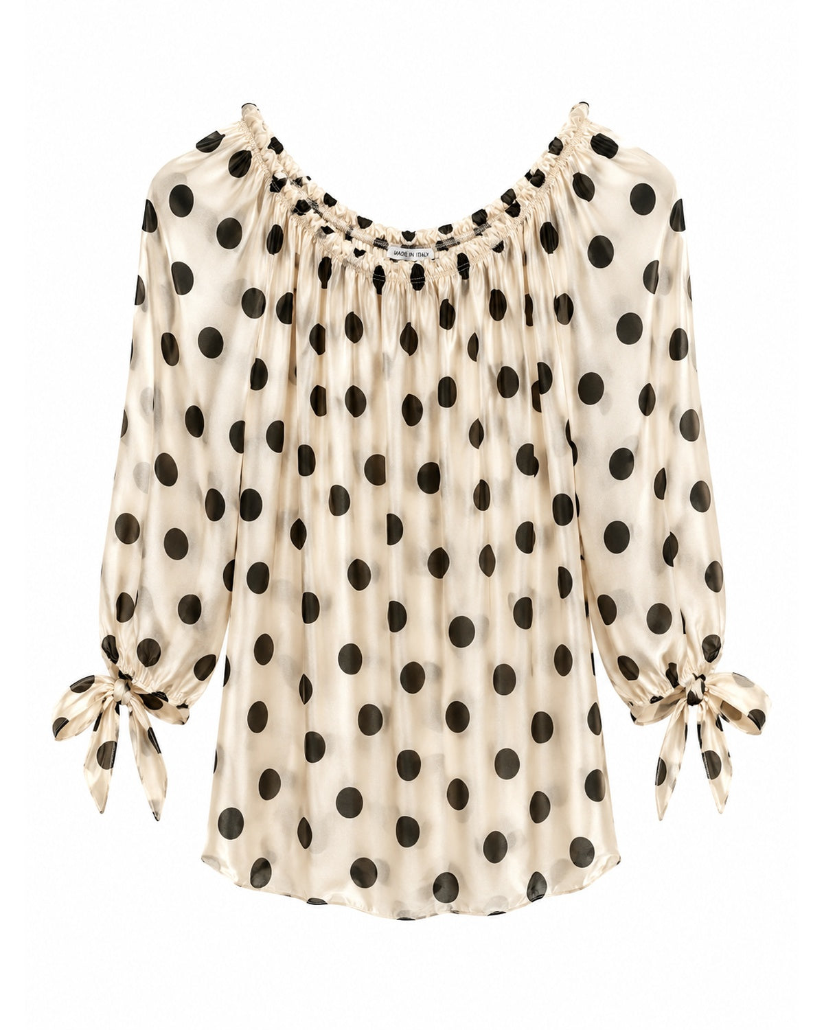 Bluse med sorte polkaprikker