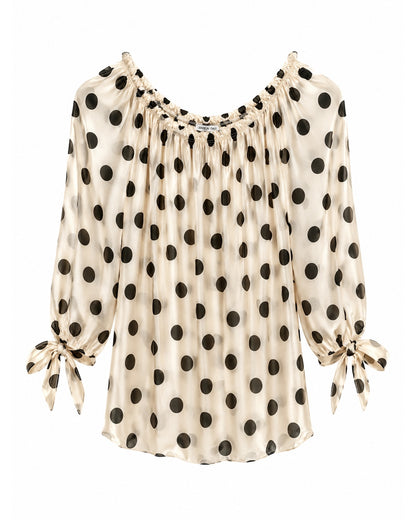 Bluse med sorte polkaprikker