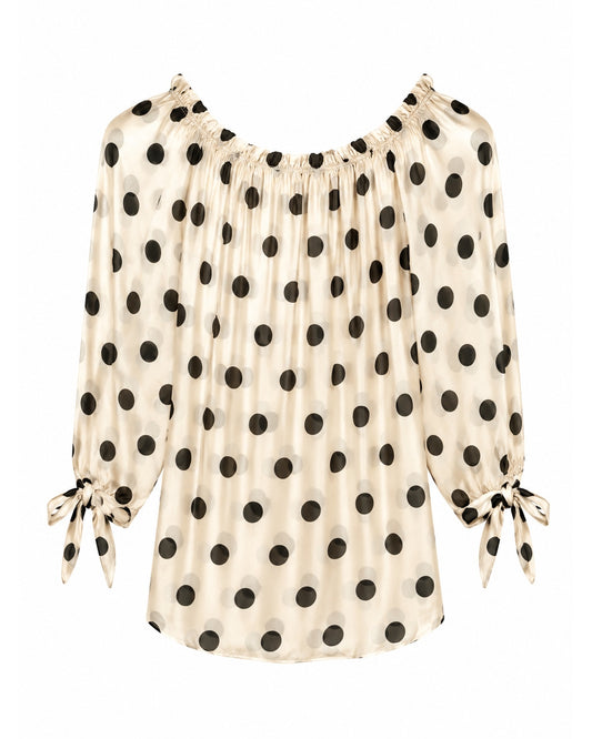 Bluse med sorte polkaprikker
